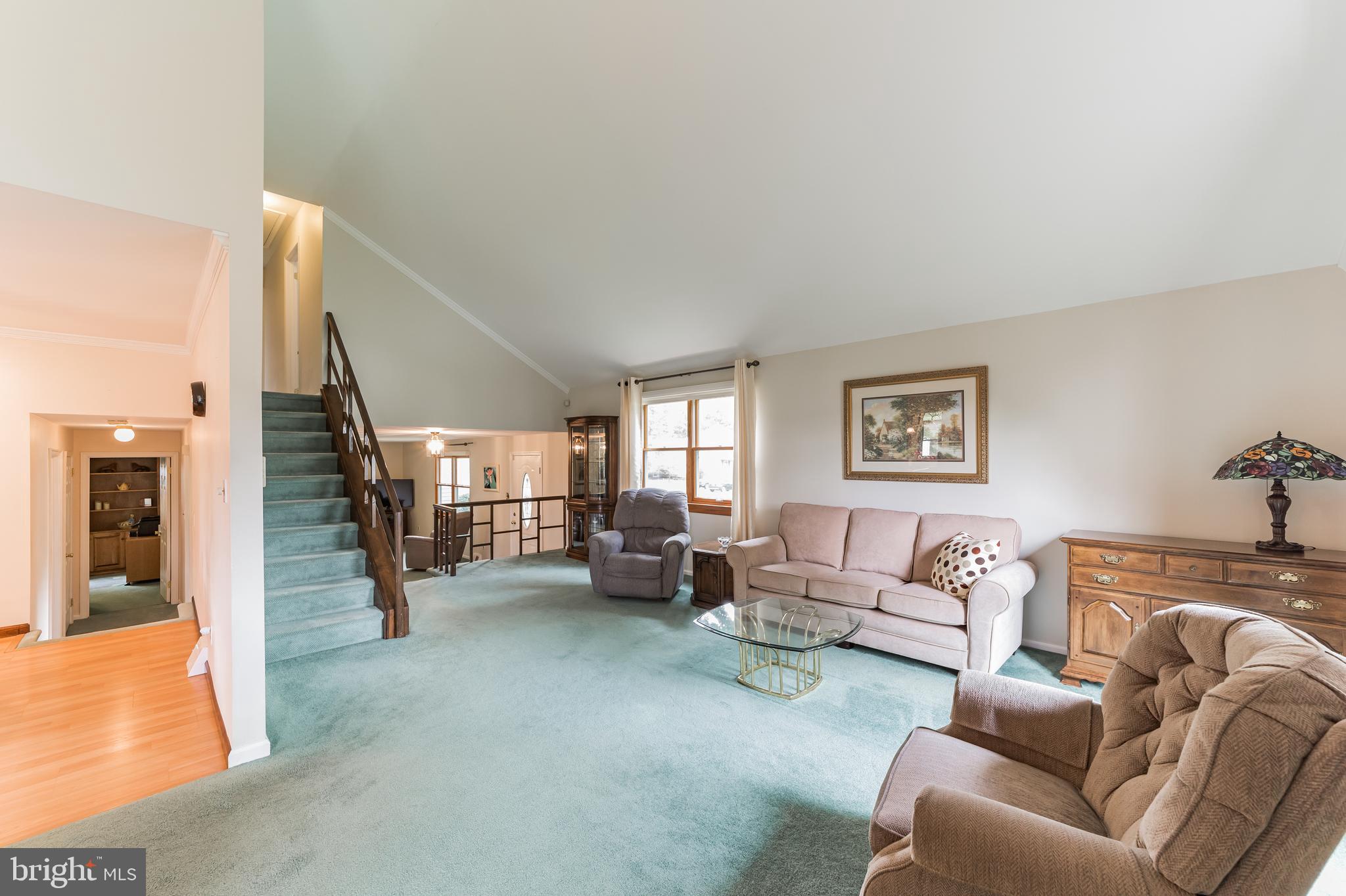69 St Davids Road Springfield, PA 19064 - Photo 6 of 21 a living room with furniture and a wooden floor