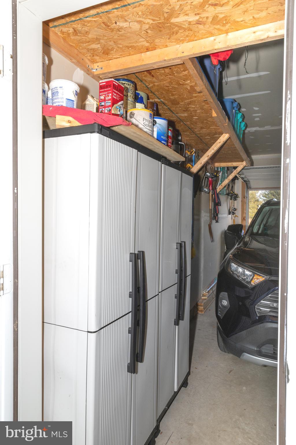 8600 Roaming Ridge Way, Unit 303 Odenton, MD 21113 - Photo 25 of 36 garage w/ extra storage