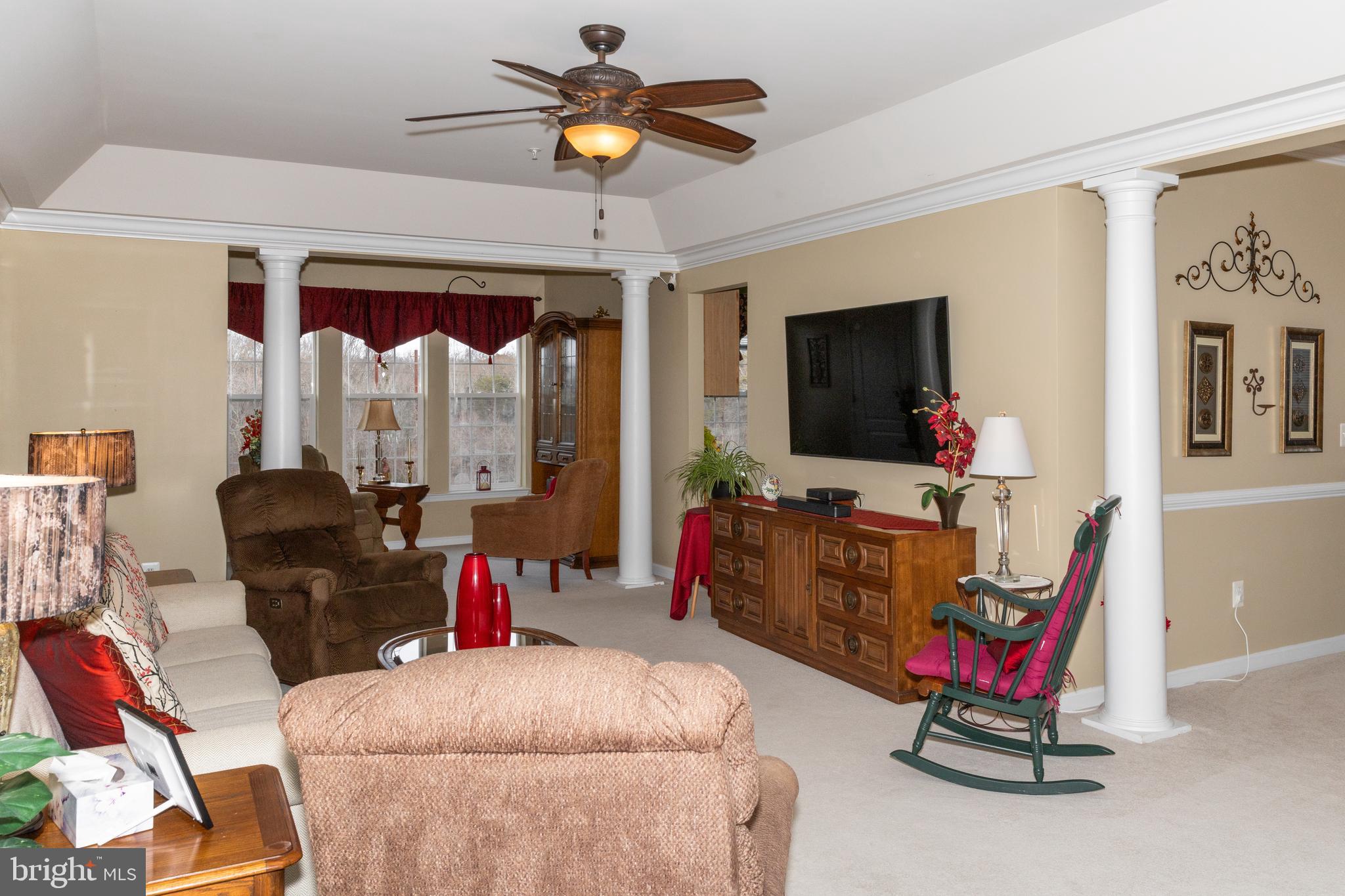 8600 Roaming Ridge Way, Unit 303 Odenton, MD 21113 - Photo 5 of 36 Living Room with Sitting Room