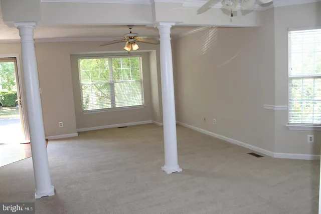 an empty room with windows