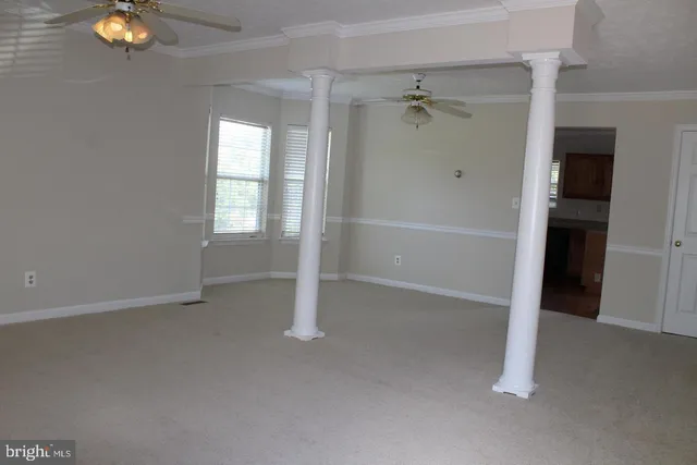 an empty room with windows