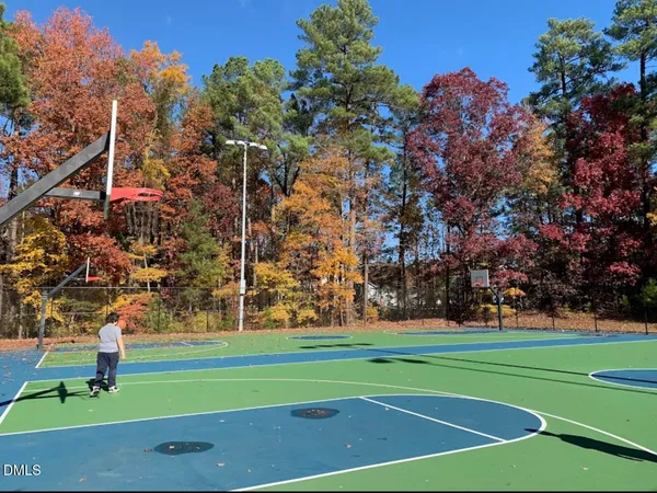 a view of a swimming pool with an outdoor space and seating area