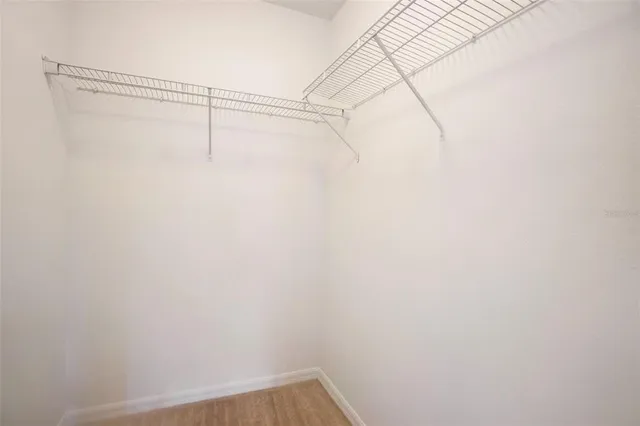 a view of a room with racks on the wall