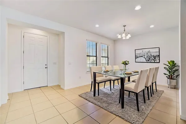 a view of a dining room with furniture