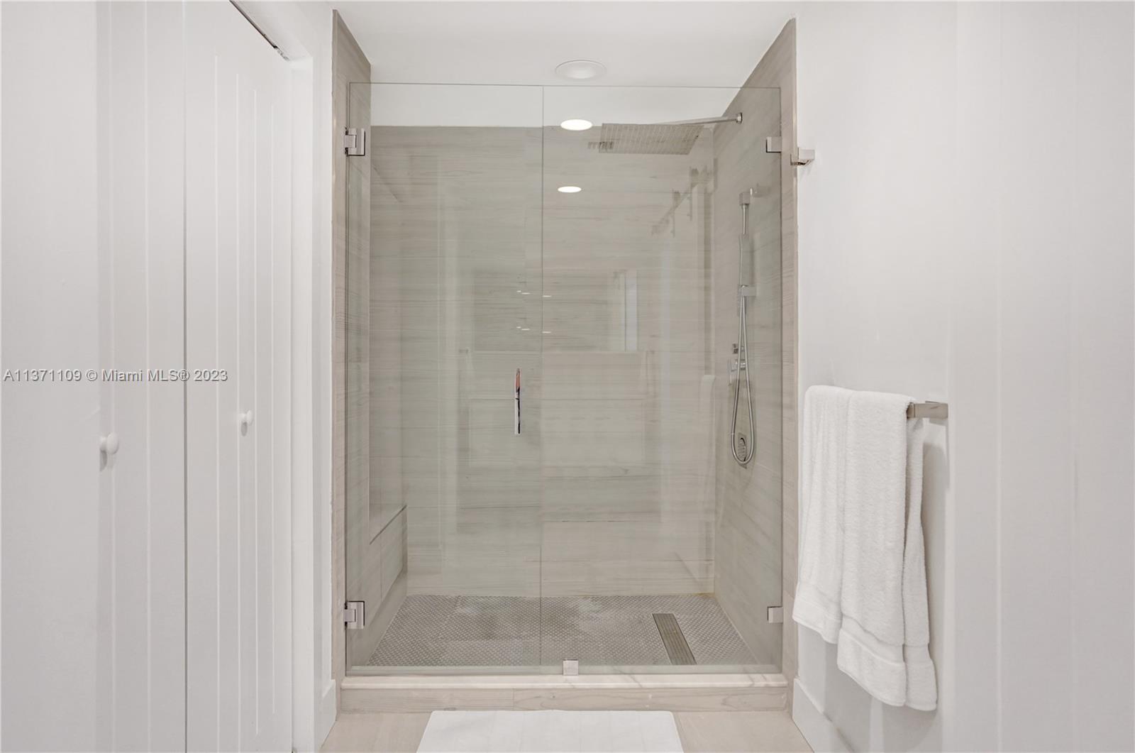 166 Harbor Drive, Unit 3C Key Biscayne, FL 33149 - Photo 25 of 78 a bathroom with a shower