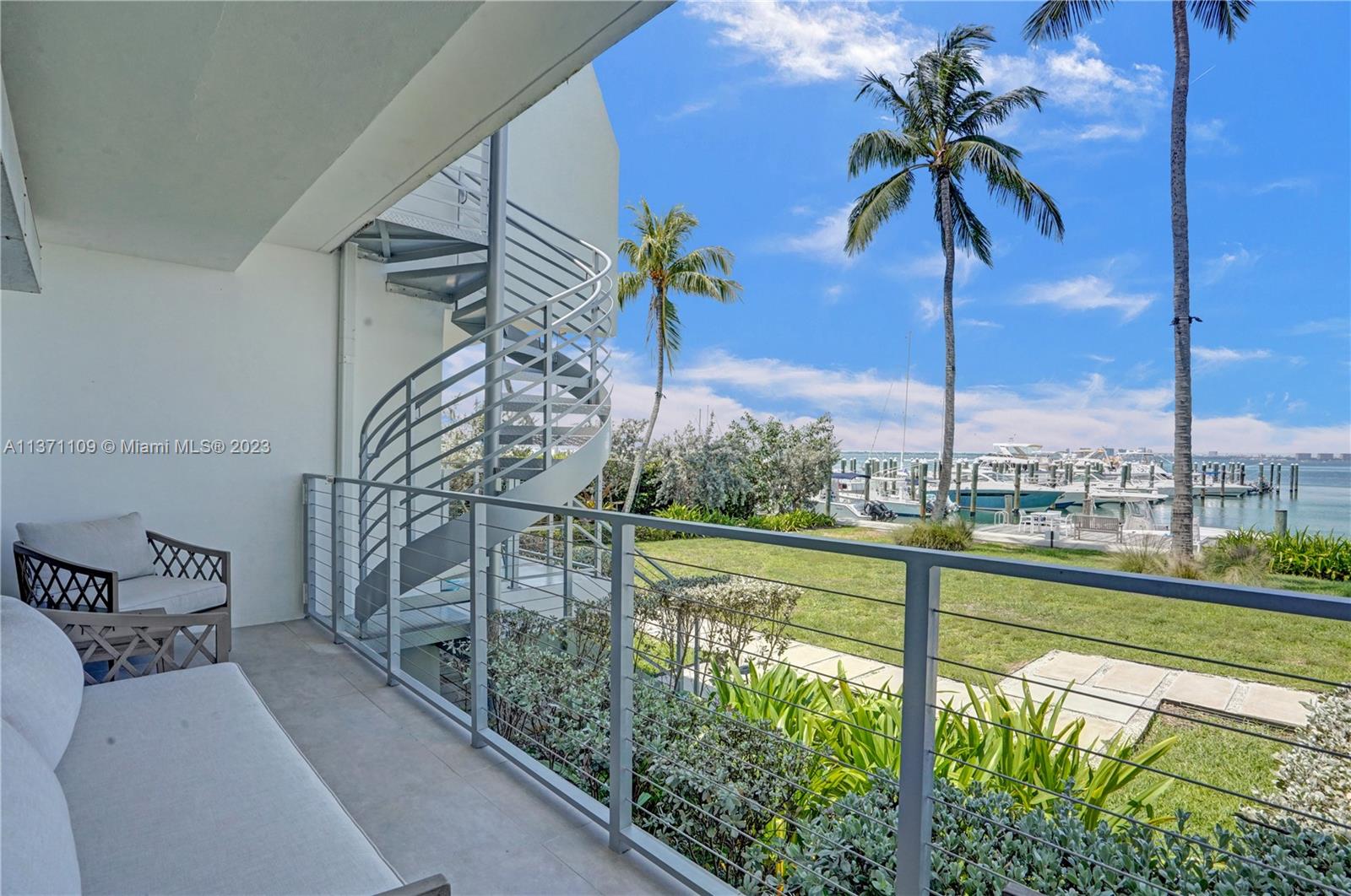 166 Harbor Drive, Unit 3C Key Biscayne, FL 33149 - Photo 38 of 78 a view of outdoor space with seating area