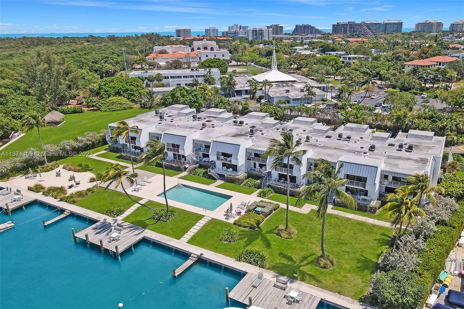 166 Harbor Drive, Unit 3C Key Biscayne, FL 33149 - Photo 66 of 78 an aerial view of a house with a big yard