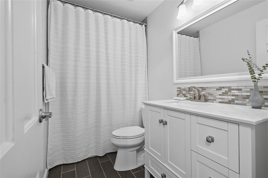 215 McIntyre Road Pittsburgh, PA 15237 - Photo 18 of 28 a bathroom with a sink toilet and shower