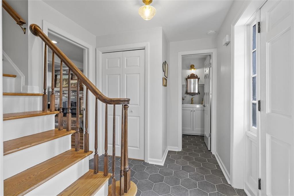 215 McIntyre Road Pittsburgh, PA 15237 - Photo 22 of 28 a view of entryway with wooden floor and stairs