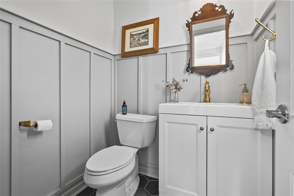 215 McIntyre Road Pittsburgh, PA 15237 - Photo 23 of 28 a white toilet sitting next to a bathroom sink