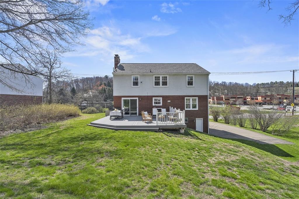 215 McIntyre Road Pittsburgh, PA 15237 - Photo 27 of 28 a view of a house with a yard and sitting area