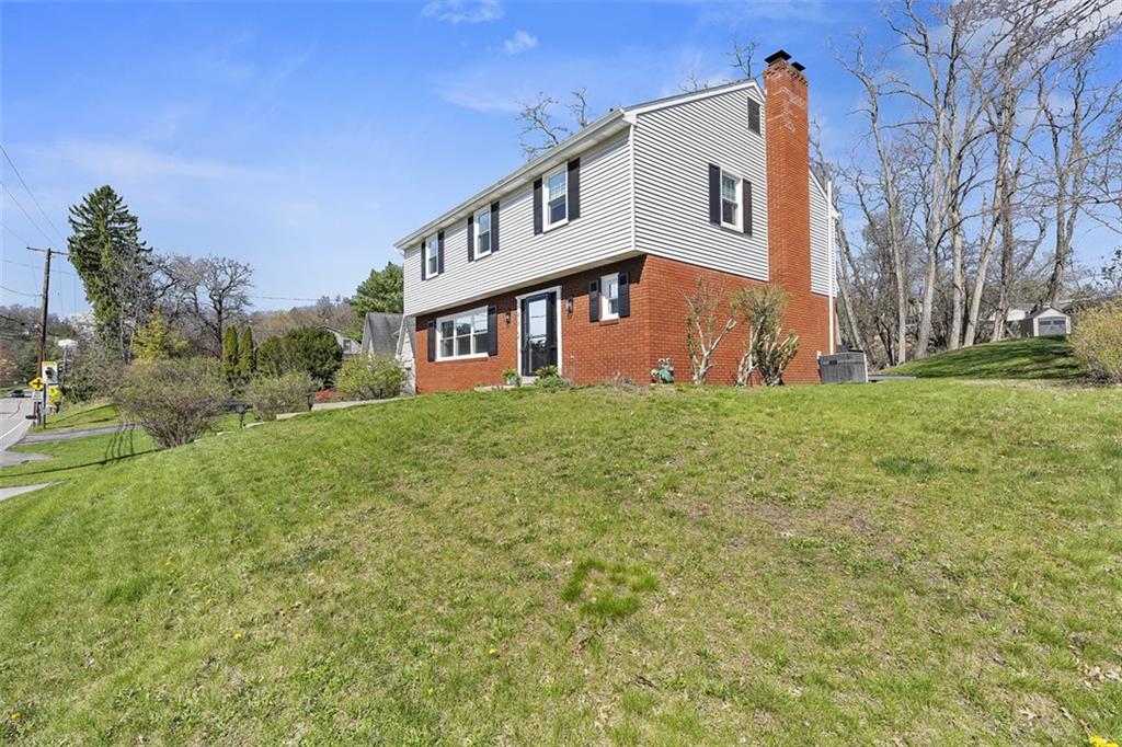 215 McIntyre Road Pittsburgh, PA 15237 - Photo 28 of 28 a view of a white house with a big yard and large trees