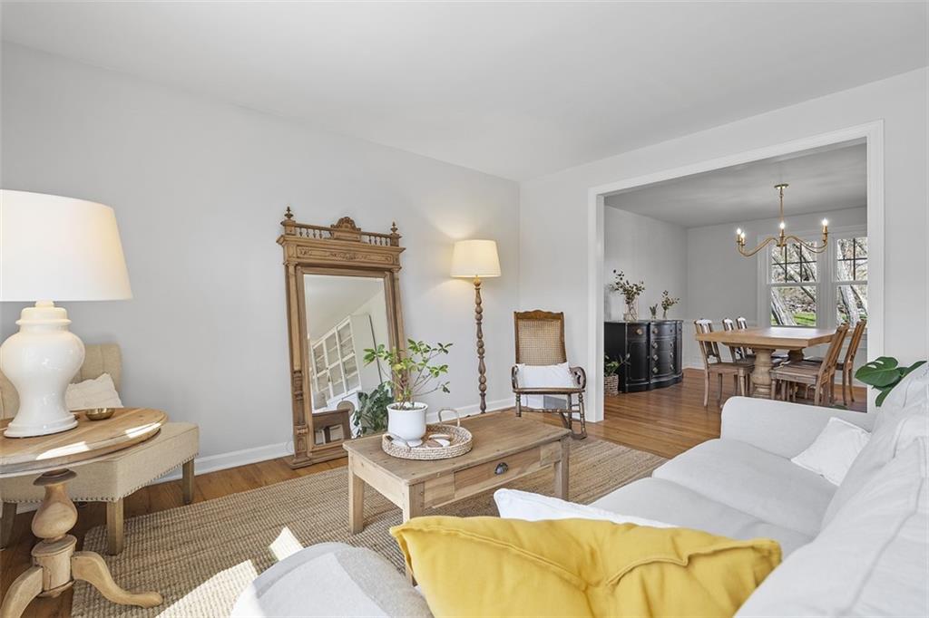 215 McIntyre Road Pittsburgh, PA 15237 - Photo 7 of 28 a living room with furniture and a lamp