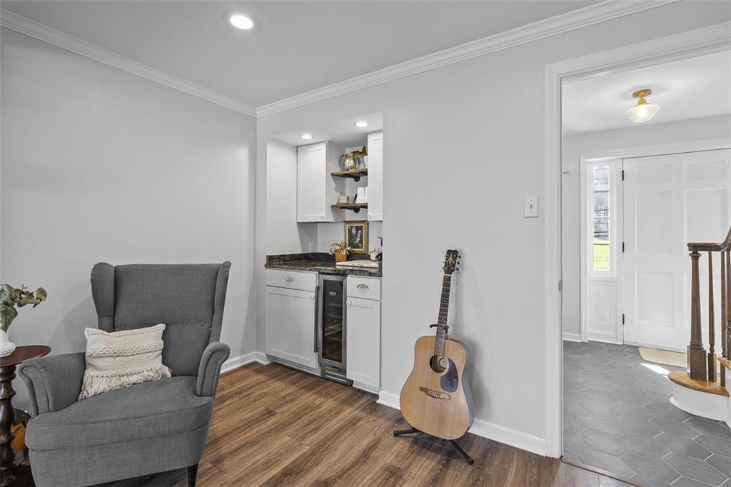 215 McIntyre Road Pittsburgh, PA 15237 - Photo 10 of 28 a living room with furniture a flat screen tv and a window
