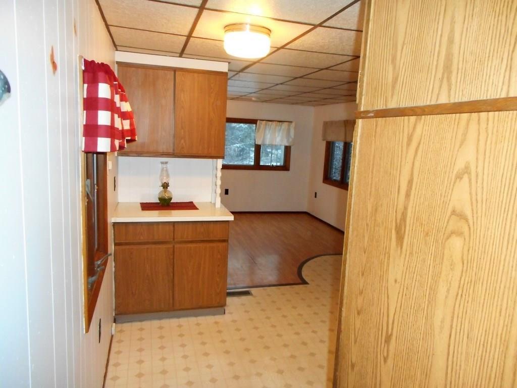 497 Main Road Milford, ME 04461 - Photo 31 of 35 Kitchen and living room area.