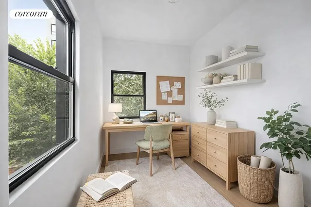 a living room with furniture wooden floor and a flat screen tv