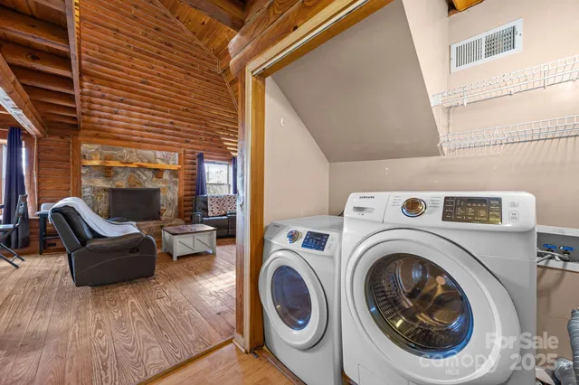 a view of livingroom with washer and dryer