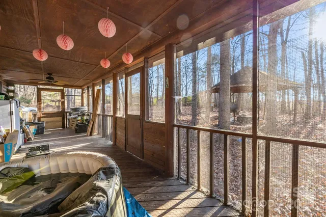 a bed room with furniture and a window