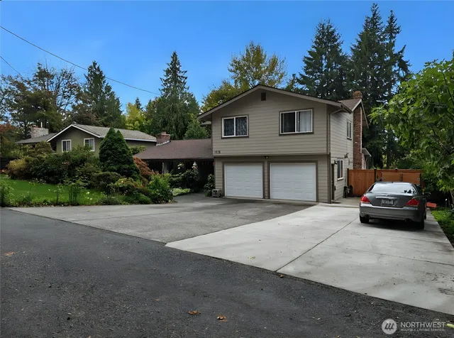 a car parked in front of a house