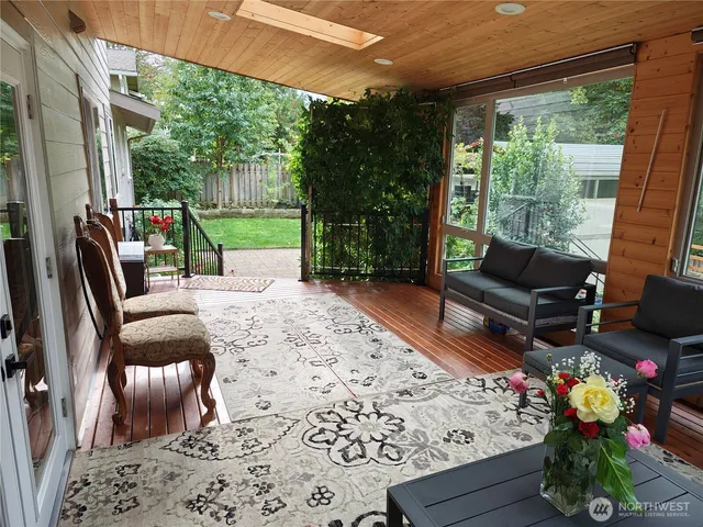 a outdoor living space with furniture and garden view
