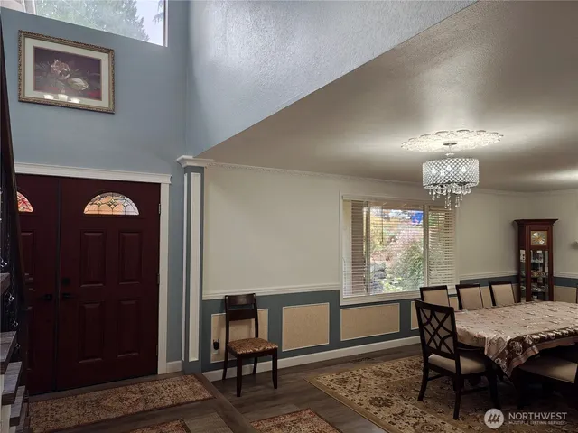 a view of a livingroom with furniture and window