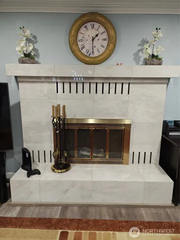 a view of a living room and entryway