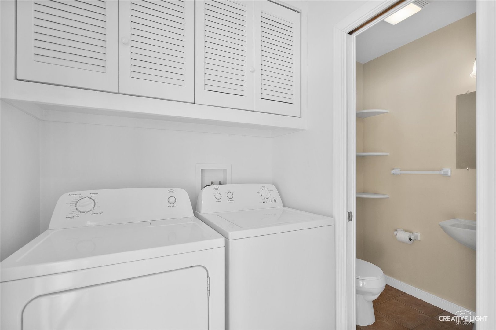 5S621 Radcliff Road Naperville, IL 60563 - Photo 16 of 27 a utility room with dryer and washer