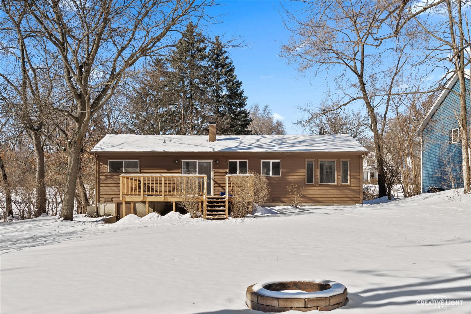 5S621 Radcliff Road Naperville, IL 60563 - Photo 27 of 27 a view of a house with a yard covered in snow