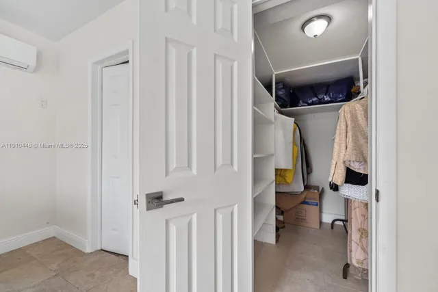 a view of a patio with a table chairs and a backyard