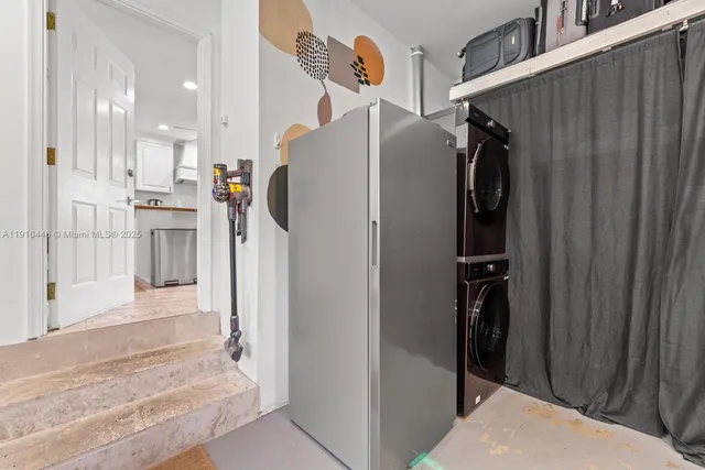 a view of a swimming pool with an outdoor space and seating area