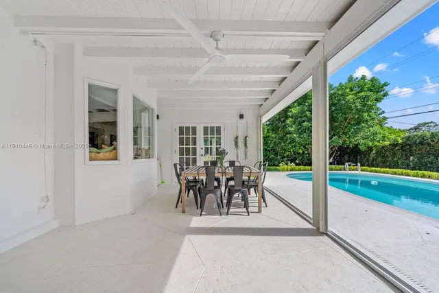 a view of house with a yard