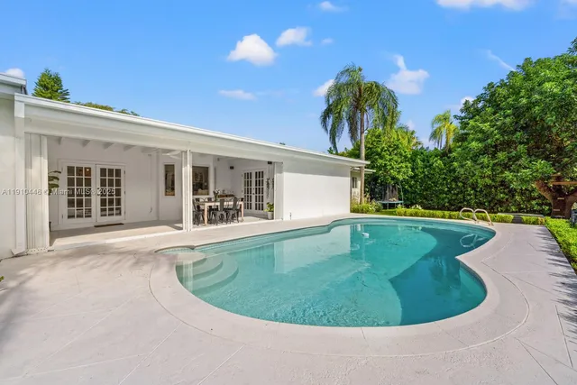a view of a garden with a tree