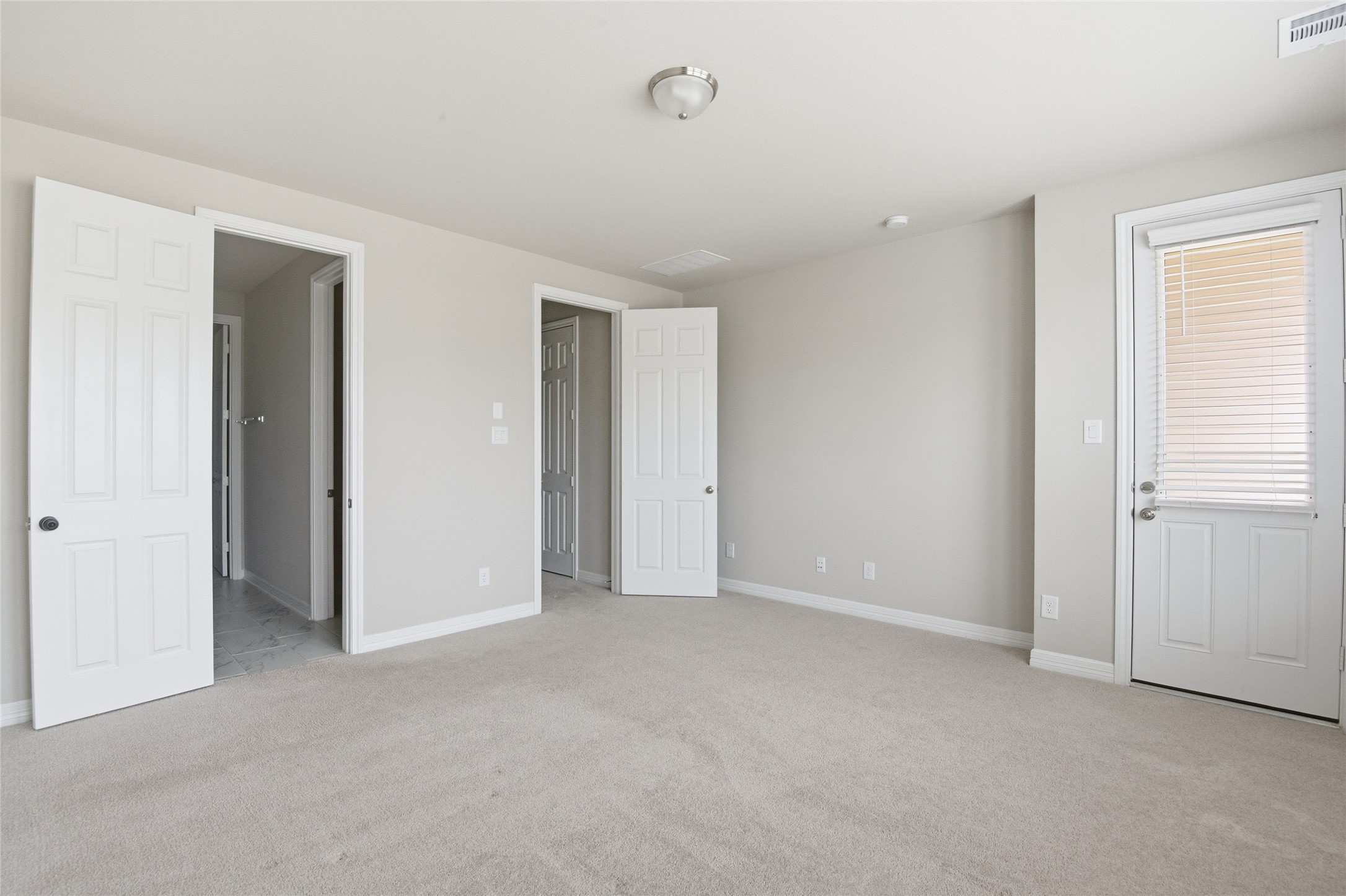 9406 Caddo Ridge Lane Cypress, TX 77433 - Photo 11 of 16 a view of an empty room with closet and a window