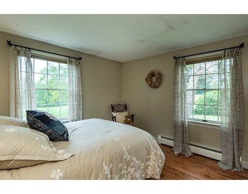 361 Oakham Road New Braintree, MA 01531 - Photo 11 of 30 a bedroom with a bed and a window