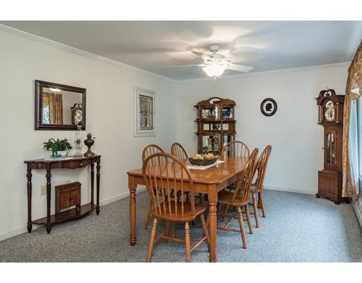 361 Oakham Road New Braintree, MA 01531 - Photo 6 of 30 a view of a dining room with furniture and wooden floor