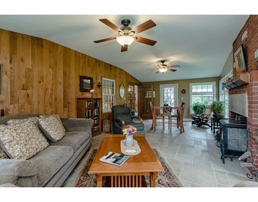 361 Oakham Road New Braintree, MA 01531 - Photo 8 of 30 a living room with furniture ceiling fan and a rug