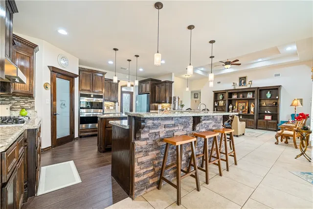 a view of a livingroom with furniture and workspace
