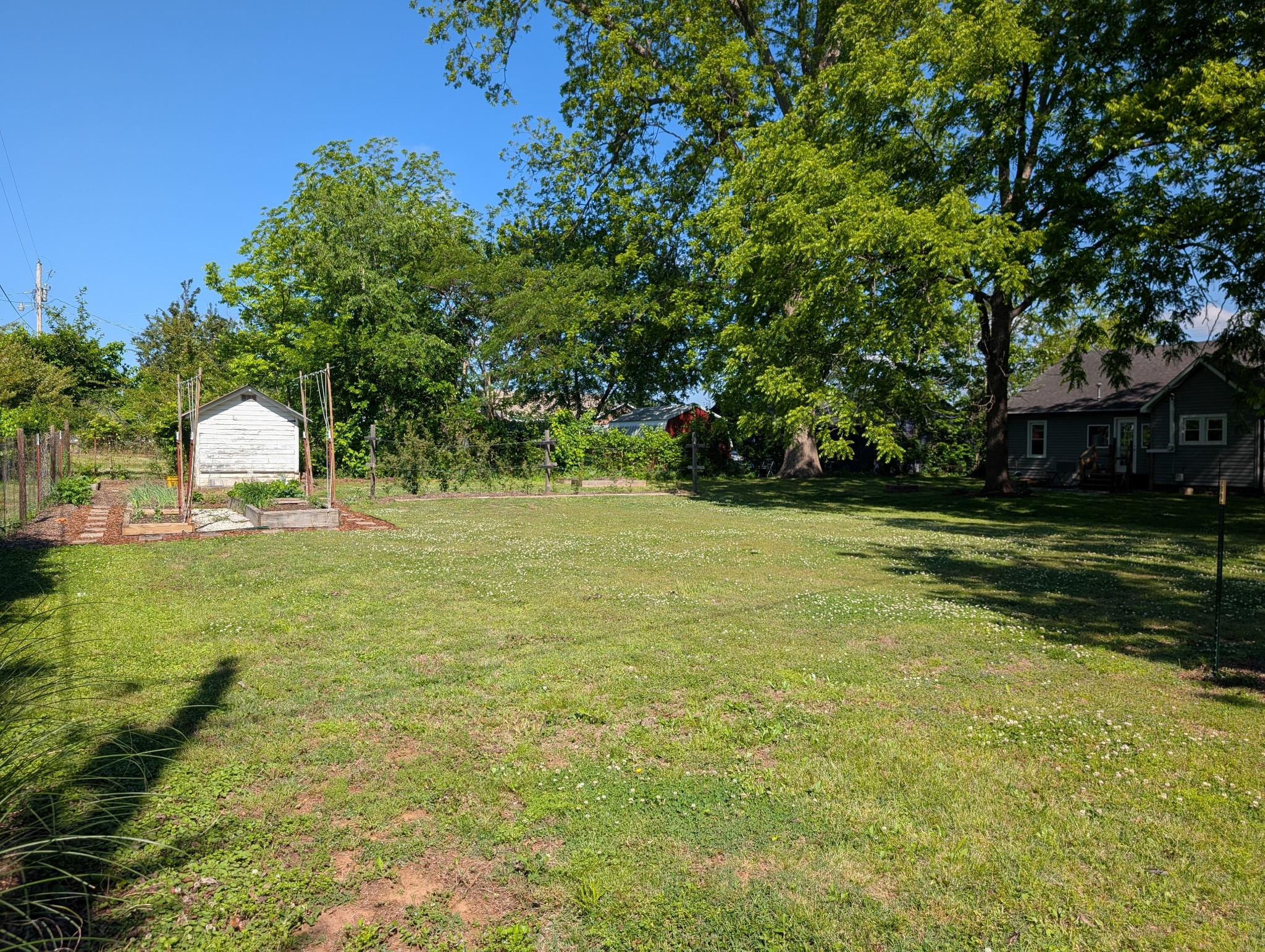 905 Nicholson Street Decherd, TN 37324 - Photo 25 of 27 a view of outdoor space with deck and yard