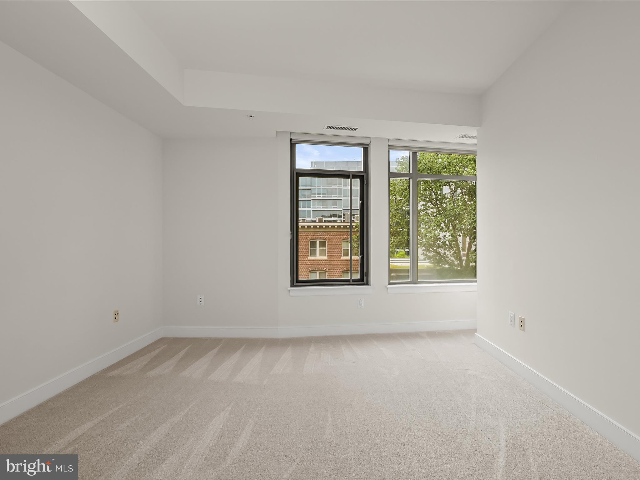 2425 L Street Northwest, Unit 536 Washington, DC 20037 - Photo 27 of 41 an empty room with a window