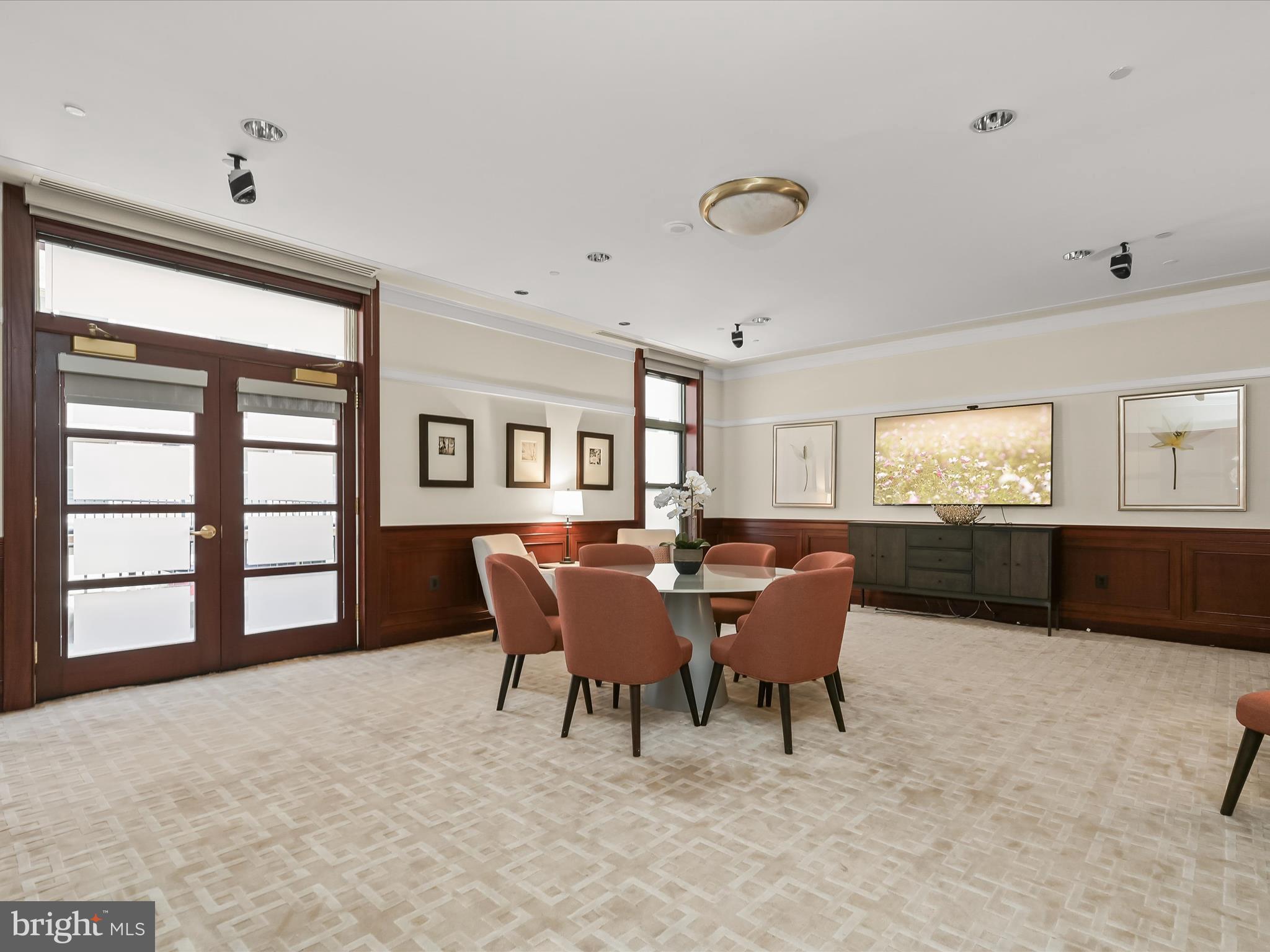 2425 L Street Northwest, Unit 536 Washington, DC 20037 - Photo 40 of 41 a dining room with furniture and windows