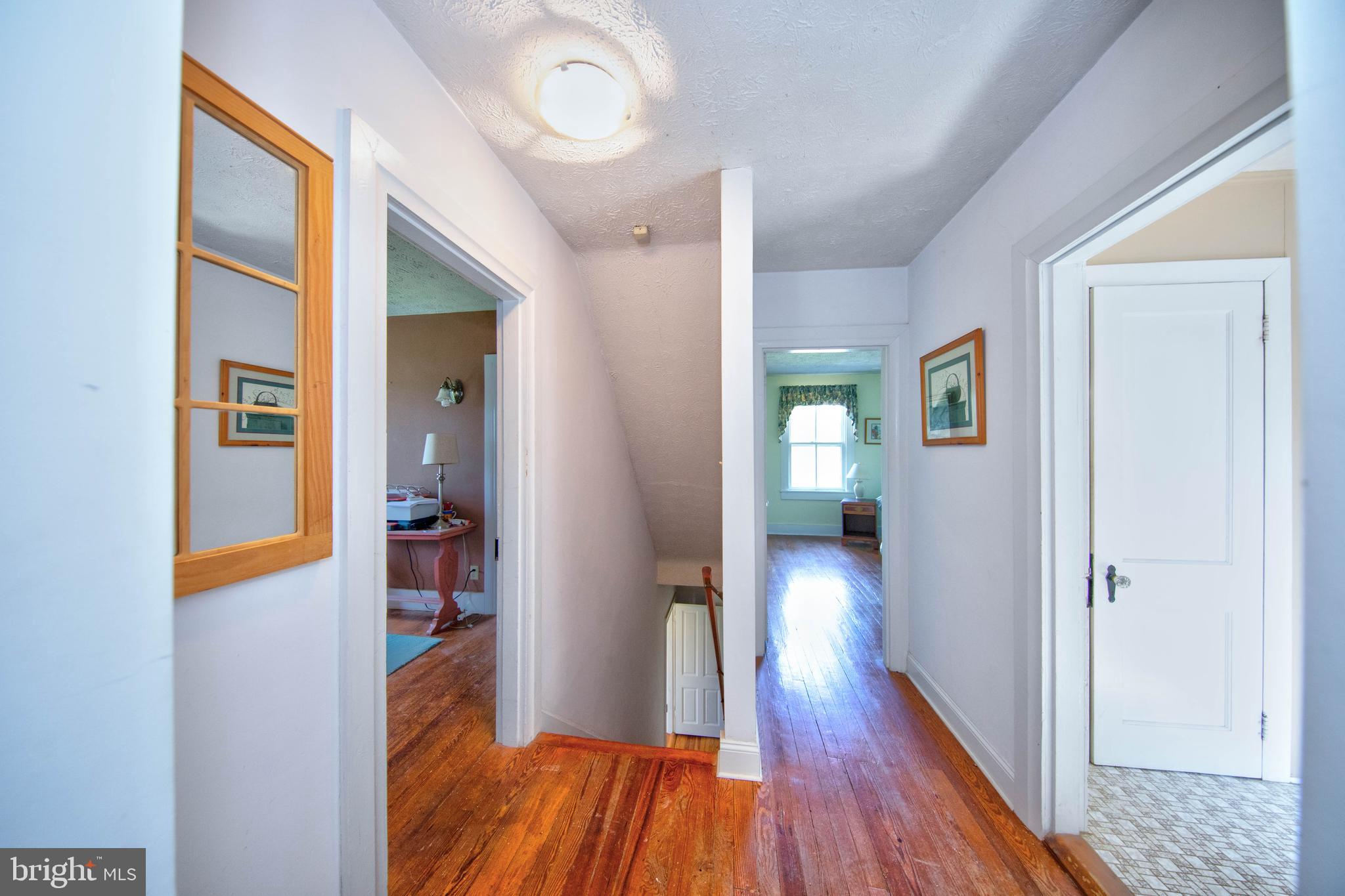 3650 Ady Road Street, MD 21154 - Photo 24 of 40 Upper level hallway with 2 staircases