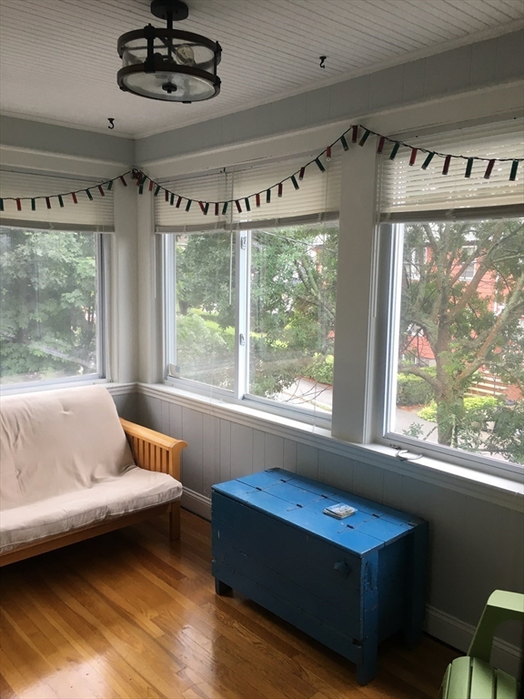 7 Richie Road, Unit 2 Quincy, MA 02169 - Photo 3 of 7 a living room with furniture and a large window