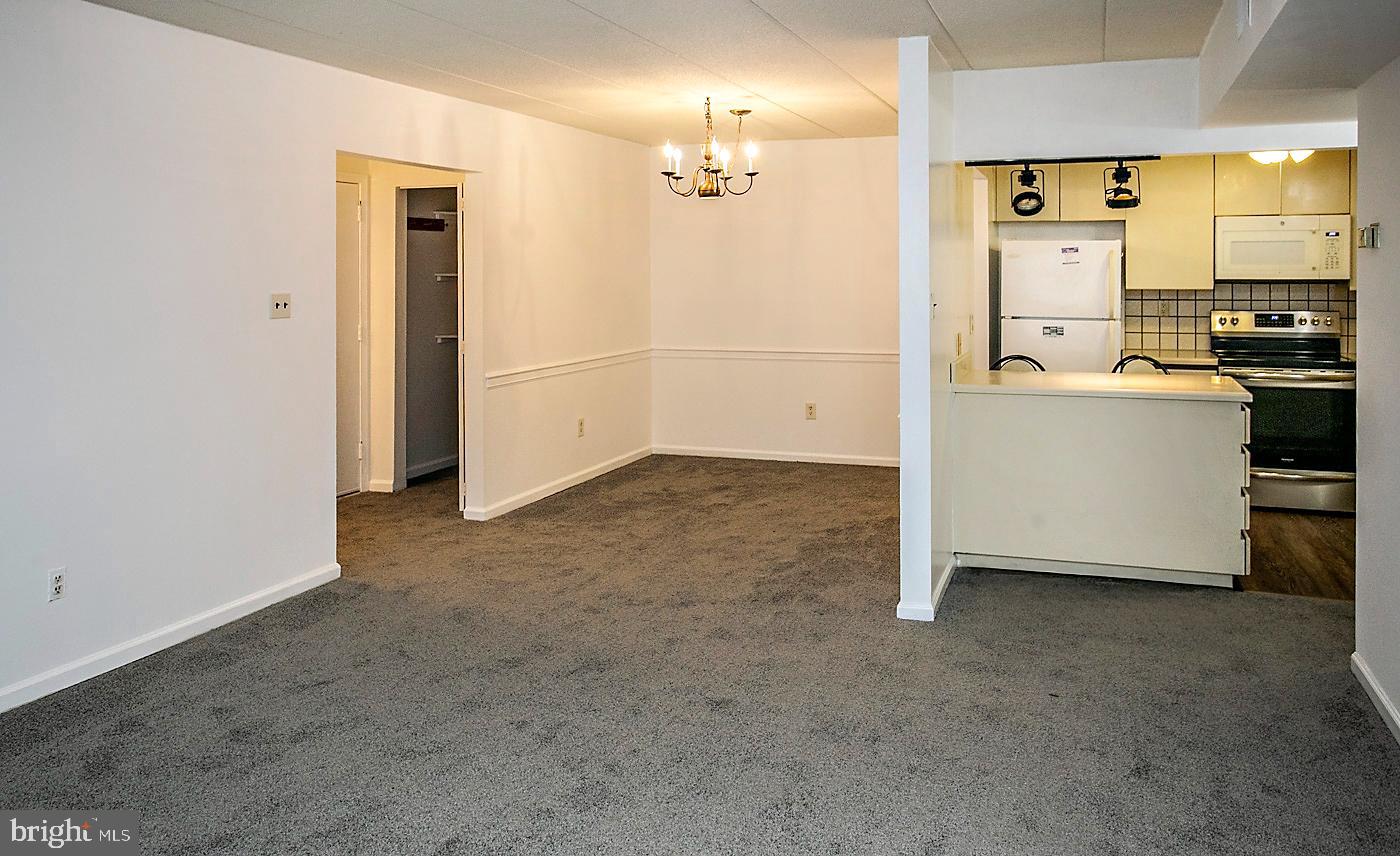 154 Woodstream Drive, Unit CONDO 154 Jeffersonville, PA 19403 - Photo 15 of 34 a view of a kitchen with a sink