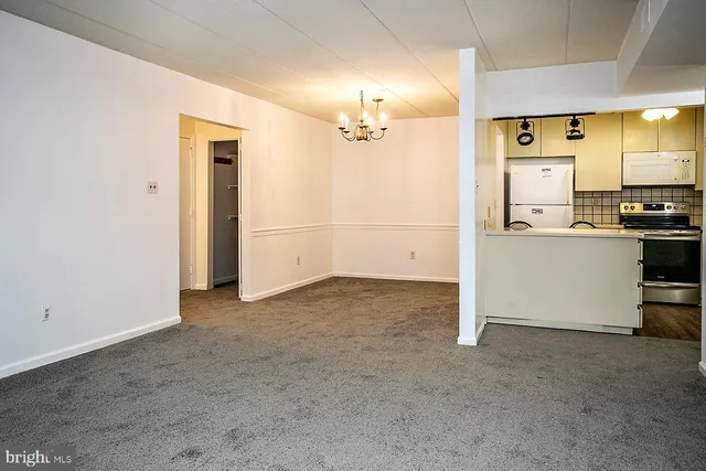 a view of a kitchen with a sink