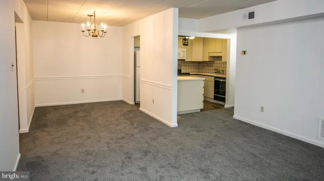 a view of a kitchen with a sink