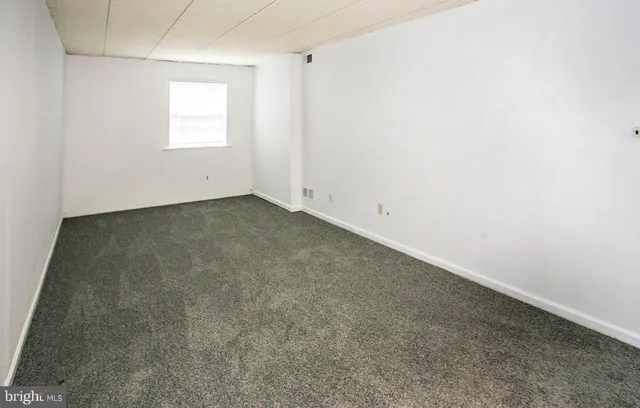 an empty room with a window