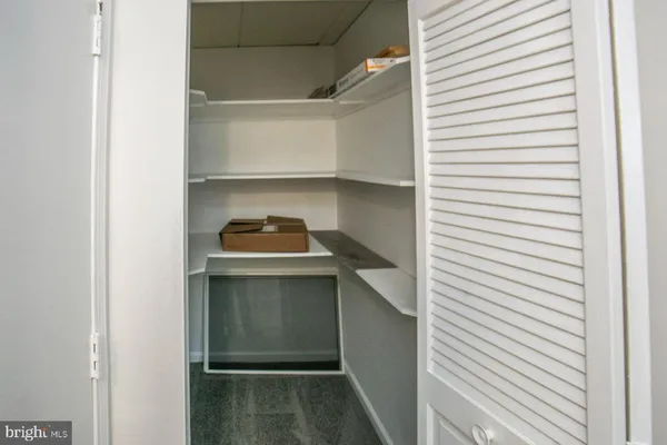 a room with storage and utility