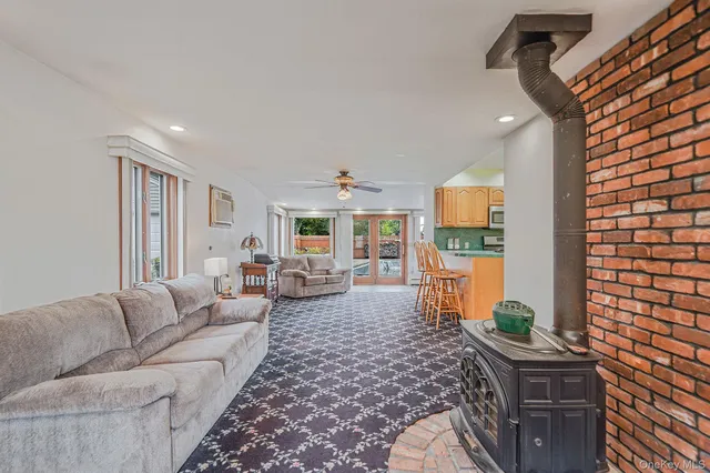 a living room with furniture and a table