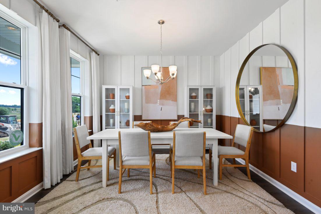453 Ensemble Way Frederick, MD 21701 - Photo 2 of 34 a view of a dining room with furniture window and outside view