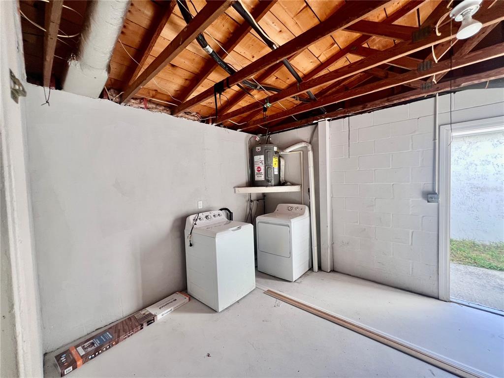 9504 Richwood Lane Port Richey, FL 34668 - Photo 14 of 16 a view of a storage & utility room
